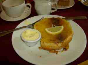 Sally Lunn bread with lemon curd and a pot of clotted cream.